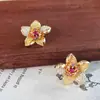 Nuevos Pendientes de Botón de Flor de Zirconia de Cobre Estilo Francés Vintage, Exquisitos Pendientes de Pistilo de Flor de Nicho de Gama Alta para Mujeres al por Mayor