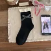 Calcetines de algodón para mujer de primavera y otoño con lazos, estilo coreano, ribete de encaje, longitud media, bloques de color, encaje, adecuados para combinar con zapatos pequeños de cuero, calcetines superpuestos