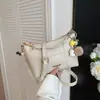Bolso de Mano Sencillo de Alto Valor Verano 2026 Nuevo Bolso de Hombro Debajo del Brazo Nicho Hombro Único Cruzado Viaje al Trabajo Bolso Cuadrado Pequeño