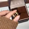 Pendientes de Nudo de Cuerda Dorada 2026 para Mujer, Diseño de Nicho de Lujo Ligero, Temperamento Único de Gama Alta, Clips para Orejas Únicos, Nuevos Pendientes al Por Mayor