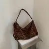 Bolsa Transfronteiriça Veludo Camurça Fosco Retrô Feminina 2026 Nova Bolsa de Ombro Cruzada Moda Versátil Bolsa Tote de Axila