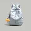 Mochila de dropshipping 2026 nuevo estilo mochila escolar para mujer gran capacidad bolsa para computadora mochila de viaje versátil ligera