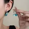 Design de Duas Formas (Frente e Trás), Brincos de Pérolas Cruzadas Transparentes 2025 Nova Moda Popular de Nicho Acessível Luxo Brincos