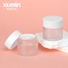 Botella de crema exfoliante espesa, moldeada por inyección, personalizada, de 50 g, de material PET, con tapa blanca brillante y boca ancha.