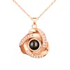 Collar de proyección 100 idiomas Te amo transfronterizo moda simple colgante de rosa espiral cadena para la clavícula en stock