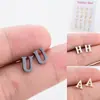 Pendientes Europa y Estados Unidos 26 letras pendientes personalizados tachuelas de cartílago para la oreja pendientes de letras pendientes pequeños exquisitos de acero inoxidable al por mayor