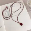 Colgante de Bolsa Pequeña Cepillada Coreana Collar de Cuerda Negra Diseño de Nicho para Mujer Cadena Larga para Suéter Accesorios Versátiles Diarios