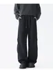 Pantalones de chándal casual rectos holgados de estilo retro americano con efecto de caída, pantalones largos de marca de moda de alta costura, pantalones de chándal versátiles para hombres y mujeres.