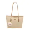 Bolso de mujer 2026 nuevo modelo primavera-verano, bolso tote simple de hombro, bolso de hombro de nicho de alta gama, comercio exterior