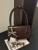 Bolsa de mano estilo retro, de alta gama, gran capacidad para mujer, nueva colección 2025, moderna y única, adecuada para ir al trabajo