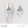 Accesorios para uñas, diamantes de imitación con forma de diamante y base plana, lentejuelas para uñas de aleación plateada, diamantes de imitación para decoración de uñas en stock, venta directa de fábrica, iridiscente