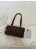 Bolso grande de mujer estilo retro, nuevo modelo de otoño 2026, bolso de hombro de alta gama para el día a día, bolso de axila moderno y versátil