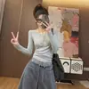 Camiseta Base de Manga Larga con Cuello Redondo y Espalda Descubierta de Malla Empalmada Gris para Mujer 2026 Otoño Diseño Único Top Súper Atractivo