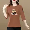 Comércio exterior transfronteiriço último lote de comércio exterior camiseta de sete mangas feminina para mães de meia-idade blusa solta plus size modeladora que cobre a barriga moderna