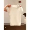 Blusa de Tricô Branca Gola Alta Curta Estilo Francês para Mulheres, Design Primavera 2026, Camisa Básica Canelada Slim-Fit