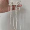 Pendientes largos de borlas con lazo de ballet francés, hechos a mano, con ocho pequeños lazos de hada iguales