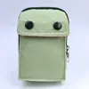 Bolso Cruzado Pequeño Casual para Hombres y Mujeres 2024 Versión Coreana Bolso Deportivo Versátil para Mujeres Bolso Ligero para Labiales Billetera Multifuncional