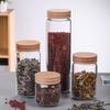 Frasco de vidrio de borosilicato de alta calidad para almacenar té, café y productos secos. Botella transparente sellada con tapa de haya roscada. Múltiples especificaciones.