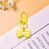 Llavero Creativo de Cuadros Dopamina con Lazo Colgante de Joyería DIY Adorno Versátil para Bolso Ropa Regalo Pequeño