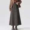 Tiro real falda midi casual a cuadros retro mujer otoño 2026 nueva cintura alta ajustada diamante falda línea A dobladillo ancho falda larga