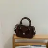 Bolso bandolera con lazo, nuevo bolso de mano de verano para ir al trabajo, bolso versátil para mujer 2026, bolso cuadrado pequeño, bolso tipo almohada moderno y dulce