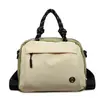 Bolsa pequena estilo coreano com color blocking para mulheres, nova bolsa de mão casual para primavera e inverno de 2026, bolsa de ombro de grande capacidade, bolsa quadrada pequena