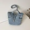 Bolso de axila de diseño retro de nicho transfronterizo para mujer, bolso de mano de lona simple y elegante, bolso de hombro casual y único para el día a día