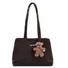 Bolso grande estilo universitario para mujer 2025 nueva moda versátil de un solo hombro simple para clase y desplazamientos bolso tote