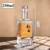 Botella de vidrio para Baijiu botella de vino vacía tamaño de un jin bonita caja de regalo privada empaque sellado estilo impreso degustación otro