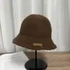 Sombrero de pescador de punto estilo coreano 2026 para otoño e invierno, color liso, casual, copa redonda, adelgazante, moderno, cálido y versátil