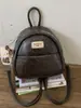 Mochila de moda versátil y casual para el trabajo y los desplazamientos, estilo coreano, con relieve, gran capacidad, nueva para Otoño e Invierno 2026