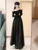 Vestido Negro Estilo Hepburn Conjunto de Falda para Mujer con Falda Larga para Superponer, Nuevo Moda Otoño 2025 Conjunto de Principios de Otoño para Mujer
