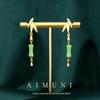 Novo estilo chinês retro estilo nacional banhado a ouro bambu incrustado imitação hetian jade brincos longos hanfu brincos delicados de alta qualidade