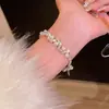 Pulseira de miçangas com senso de design avançado, pulseira de pérolas de nicho de luxo leve, temperamento versátil feminino, pulseira de rede vermelha, joias por atacado
