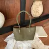 Bolso de hombro de moda texturizado retro minimalista, bolso casual de diseño de nicho para mujer, nuevo bolso de axila otoño e invierno 2026