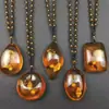 Collar de cadena para suéter con colgante de cera de abeja al por mayor resina alto sentido estilo nacional transmisión en vivo bienestar venderá joyas mujeres