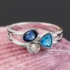 Huajie Amazon Deseo Más Vendido Europeo y Americano Estilo Nuevo Personalizado Hermoso Asimétrico Tres Colores Piedra Anillo Venta Directa