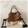 Bolsa Tote Retrô Transfronteiriça Feminina 2026 Nova de Grande Capacidade Simples de Ombro Bolsa Diária para Trabalho e Deslocamento