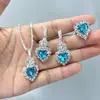 Conjunto de quatro peças estilo europeu e americano com colar, brincos e anel de cristal azul claro em formato de coração cravejado de diamantes - uma coleção transfronteiriça para mulheres