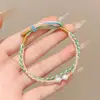 Pulseira de corda colorida zongzi do Festival do Barco-Dragão 2026 novo modelo pulseira trançada artesanal étnica infantil atacado corda vermelha