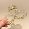 Pinza de pelo pequeña con garra para temperamento de princesa, pinza de pelo lateral estilo coreano exquisita, sensación de alta gama, nuevo pinza de pelo para media coleta 2026