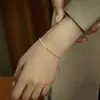 Pulsera de Perlas de Agua Dulce Natural para Mujer Diseño de Nicho Coreano Estilo Caliente Versátil de Gama Alta Joyería de Mano con Perlas Millet Ultra Finas Moderna