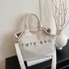 Bolso de Hombro de Gran Capacidad para Mujer Nuevo Popular Versátil de Pana para Viaje Cotidiano Coreano de Nicho Bolso Tote de Mano con Letras
