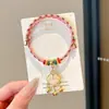 Pulsera de Hilo Rojo de Bebé de Dibujos Animados 2026 Nuevo Estilo Bendición Pequeño Zongzi Pulsera Estilo Chino Festival del Bote del Dragón Hilo de Cinco Colores Ajustable Venta al por Mayor