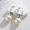 Brincos de Pérola Banhados a Ouro 18K de Aço Inoxidável Transfronteiriços para Mulheres Ins Nicho Luxo Acessível Brincos de Trabalho de Alta Qualidade Dropshipping