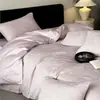Lujoso y elegante juego de ropa de cama jacquard de algodón 100% de cuatro piezas para el dormitorio principal, que incluye una sábana bajera y una funda de edredón de algodón puro, apto para todas las estaciones