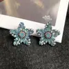 Europa y Estados Unidos nuevos pendientes exagerados de circonita de diamante de cinco puntas pendientes temperamento femenino transfronterizos color retro pendientes geométricos