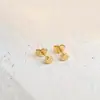 Aretes de Tuerca Geométricos de Estrella de Acero Titanio con Bolas de Acero Grandes y Pequeñas de Moda Simple al por Mayor de Fábrica de Venta Caliente Aretes Perforados Mujeres