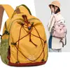 Mochila Funcional de Bloques de Color Amarillo Atardecer y Verde Oliva para Parejas, Ligera para Senderismo al Aire Libre y Montañismo, Mochila Transfronteriza