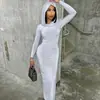 Vestido ajustado liso con capucha estilo europeo y americano, Falda lápiz larga de un solo paso estilo socialité, Vestido suéter de manga larga para mujer, Exportación